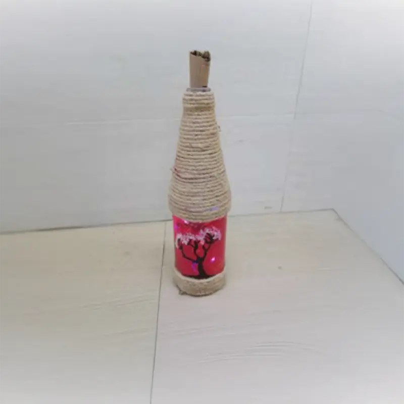 Hand-Painted Jute Bottle – Eco-Friendly Decorative Piece